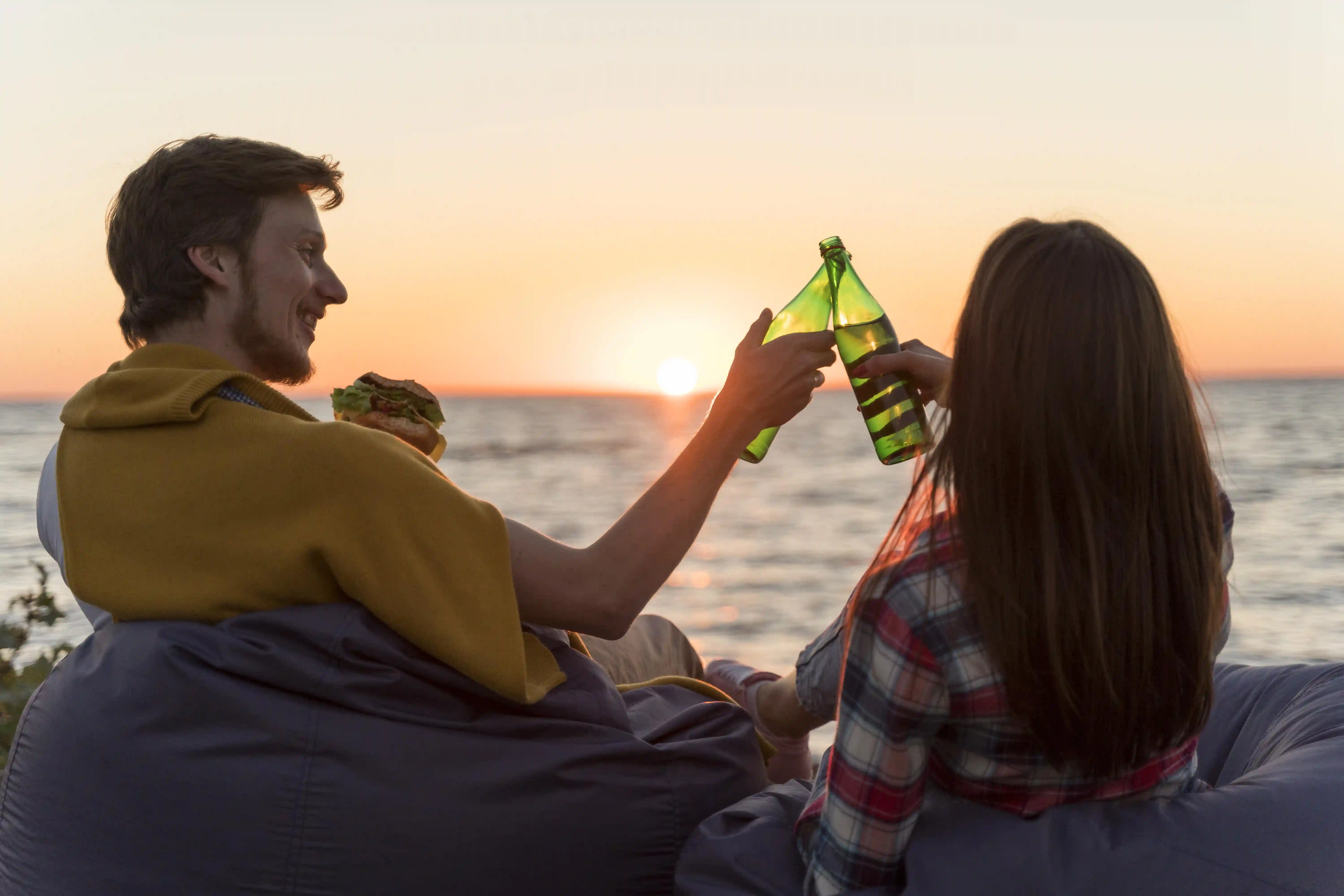 Friends toasting at sunset